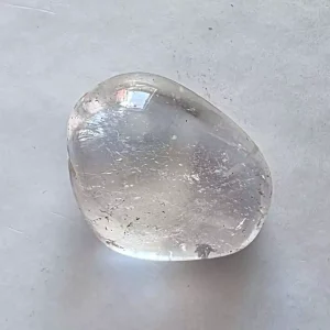 A single Clear Quartz Tumbled and Polished Stone