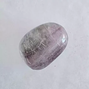 A single Rainbow Flourite Tumbled and Polished Stone